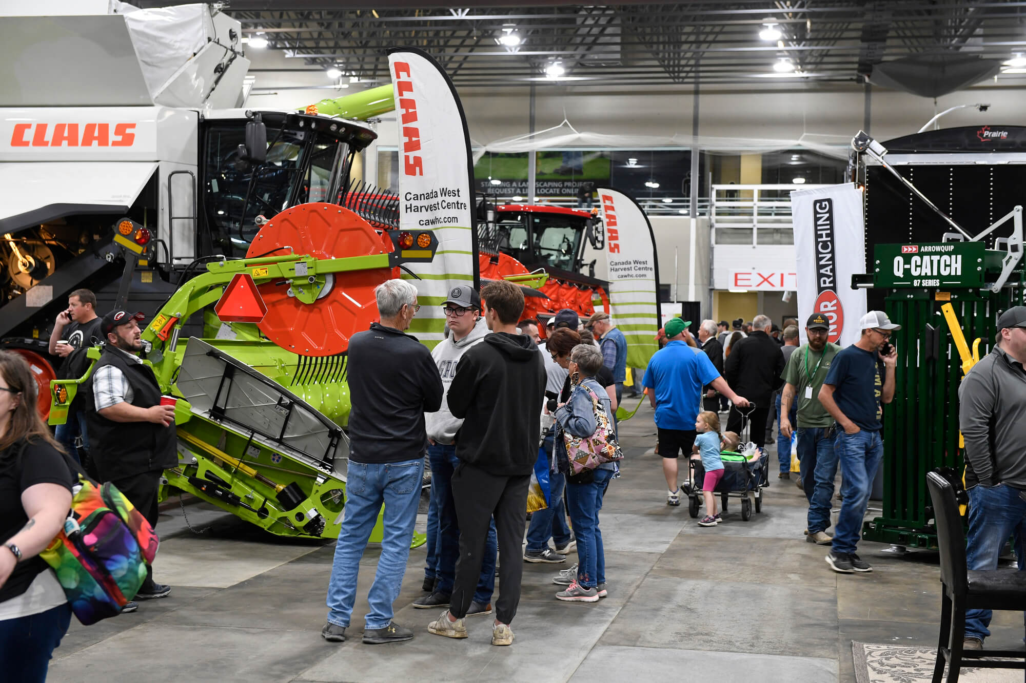 A row of Ag Tech equipment exhibits at Canada's Farm Show Regina, hosted by REAL District