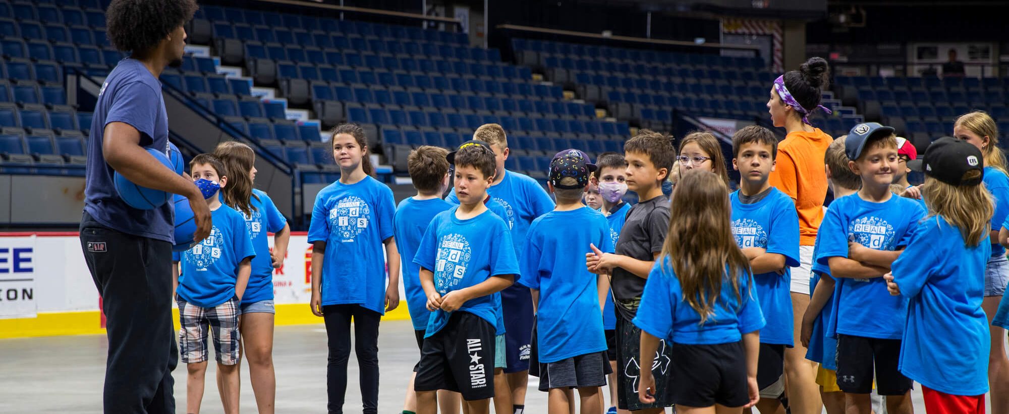 Kid's receiving instructions during a summer camp event at REAL District, Regina